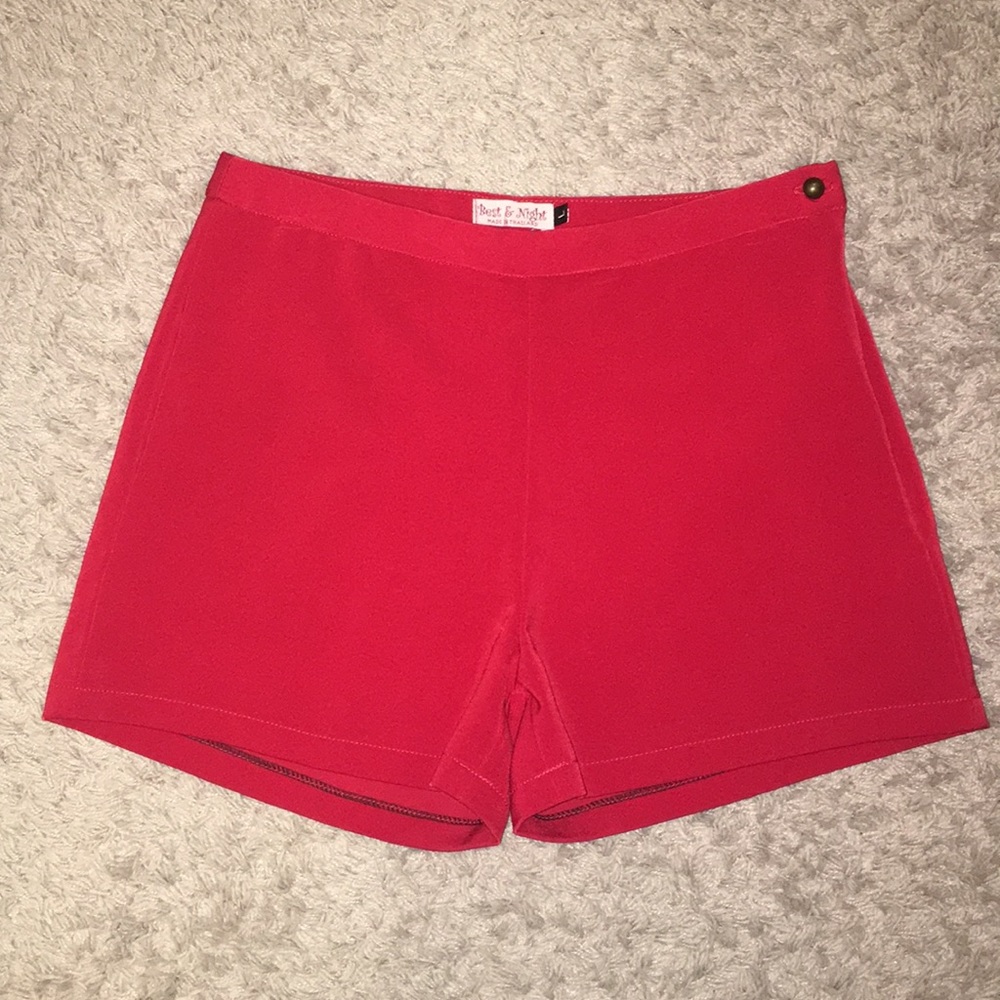 Red zip up, high waisted shorts